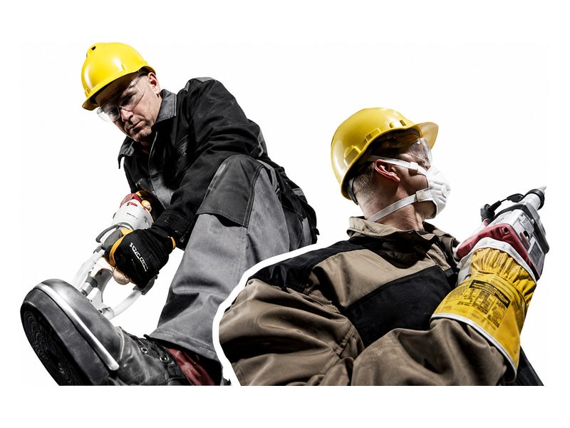 Arbeitskleidung, Schutzhelm, Schutzbrille und Handschuhe im Einsatz